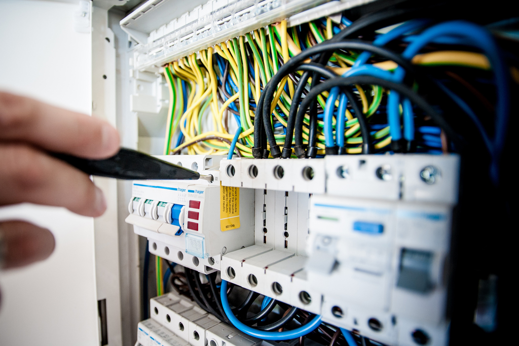 Specialist technician providing on-site electrical support